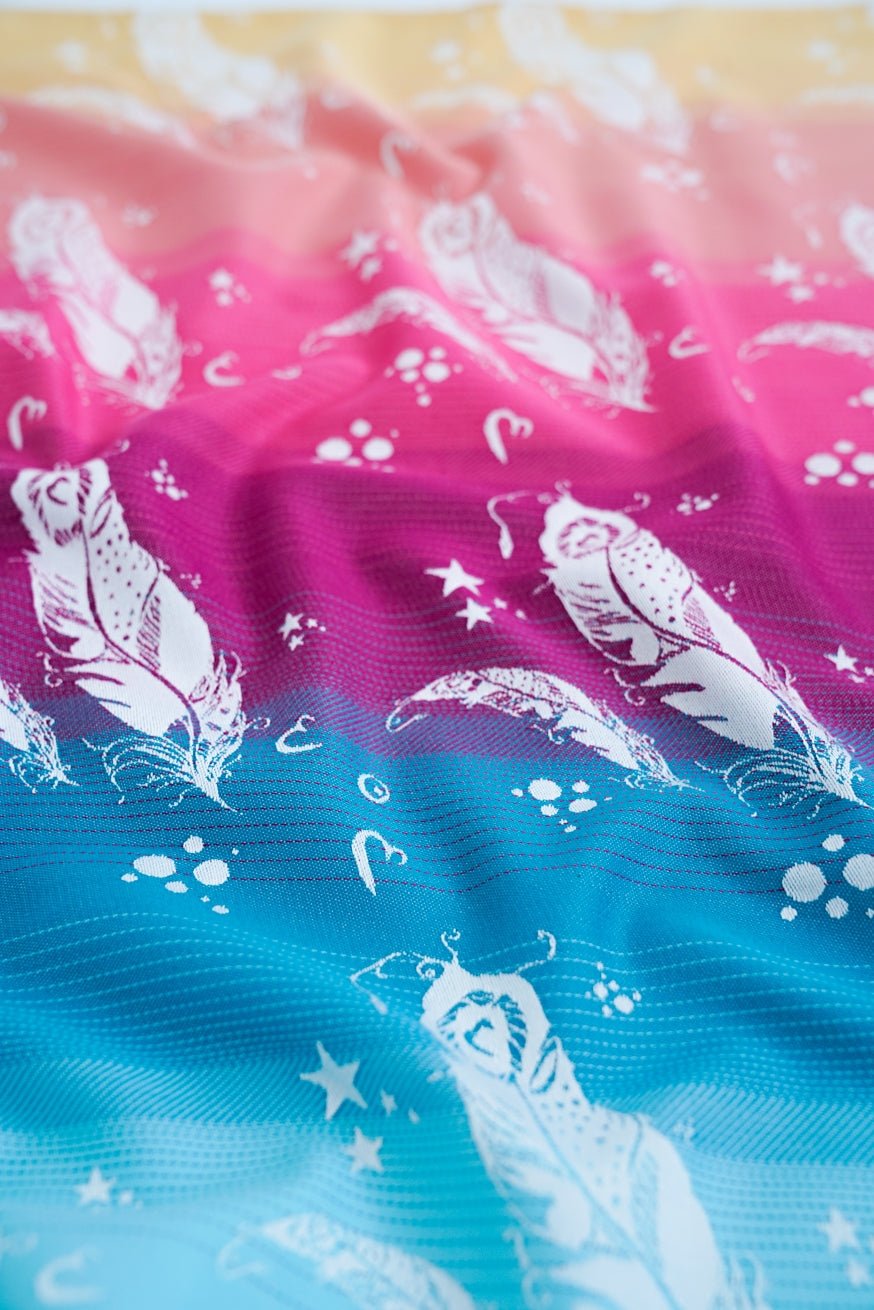 KOKADI bärsele WrapStar Fjädrar Hannah